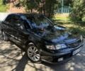Зеленый Мазда 626, объемом двигателя 2 л и пробегом 438 тыс. км за 2500 $, фото 1 на Automoto.ua
