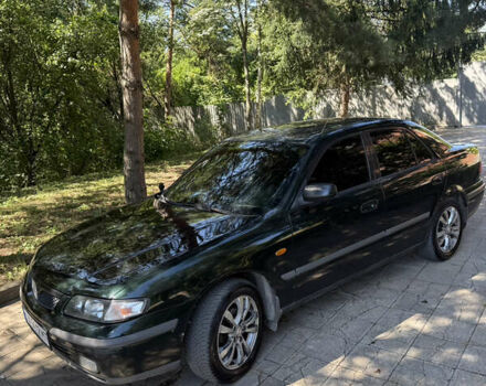 Зеленый Мазда 626, объемом двигателя 2 л и пробегом 438 тыс. км за 2500 $, фото 16 на Automoto.ua