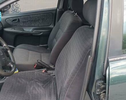 Зеленый Мазда 626, объемом двигателя 1.84 л и пробегом 319 тыс. км за 1700 $, фото 6 на Automoto.ua