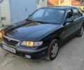 Зеленый Мазда 626, объемом двигателя 2 л и пробегом 290 тыс. км за 1750 $, фото 1 на Automoto.ua