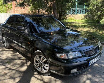 Зеленый Мазда 626, объемом двигателя 2 л и пробегом 438 тыс. км за 2500 $, фото 1 на Automoto.ua