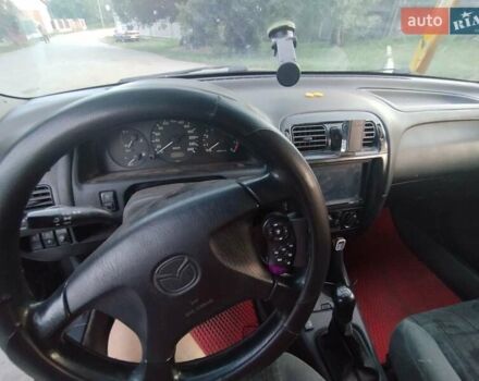 Зеленый Мазда 626, объемом двигателя 1.84 л и пробегом 421 тыс. км за 2500 $, фото 10 на Automoto.ua