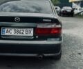 Зелений Мазда 626, об'ємом двигуна 2 л та пробігом 300 тис. км за 2305 $, фото 1 на Automoto.ua