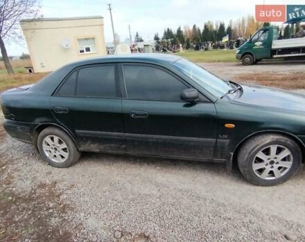 Зеленый Мазда 626, объемом двигателя 1.84 л и пробегом 421 тыс. км за 2500 $, фото 5 на Automoto.ua