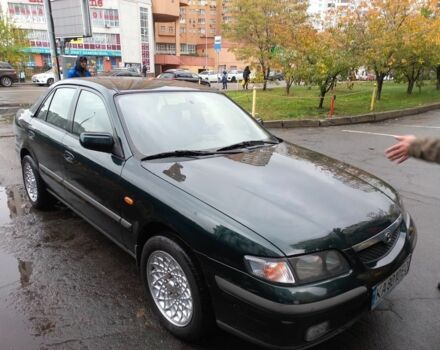 Зеленый Мазда 626, объемом двигателя 2 л и пробегом 250 тыс. км за 3600 $, фото 1 на Automoto.ua