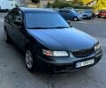 Зеленый Мазда 626, объемом двигателя 2 л и пробегом 185 тыс. км за 2350 $, фото 1 на Automoto.ua