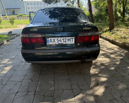 Зеленый Мазда 626, объемом двигателя 2 л и пробегом 438 тыс. км за 2500 $, фото 2 на Automoto.ua