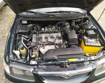 Зеленый Мазда 626, объемом двигателя 2 л и пробегом 250 тыс. км за 3600 $, фото 5 на Automoto.ua