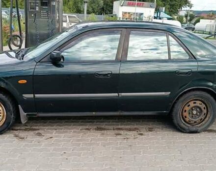 Зеленый Мазда 626, объемом двигателя 1.84 л и пробегом 319 тыс. км за 1700 $, фото 2 на Automoto.ua