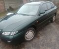 Зеленый Мазда 626, объемом двигателя 2 л и пробегом 350 тыс. км за 4200 $, фото 1 на Automoto.ua