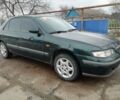 Зеленый Мазда 626, объемом двигателя 2 л и пробегом 246 тыс. км за 3850 $, фото 1 на Automoto.ua