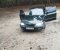 Зеленый Мазда 626, объемом двигателя 2 л и пробегом 356 тыс. км за 2707 $, фото 1 на Automoto.ua