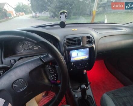 Зеленый Мазда 626, объемом двигателя 1.84 л и пробегом 421 тыс. км за 2500 $, фото 6 на Automoto.ua