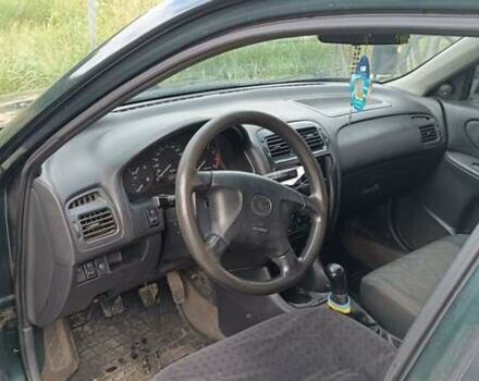 Зеленый Мазда 626, объемом двигателя 1.84 л и пробегом 319 тыс. км за 1700 $, фото 5 на Automoto.ua