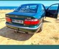 Зеленый Мазда 626, объемом двигателя 2 л и пробегом 230 тыс. км за 2200 $, фото 1 на Automoto.ua