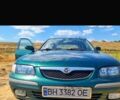 Зеленый Мазда 626, объемом двигателя 2 л и пробегом 260 тыс. км за 2500 $, фото 1 на Automoto.ua