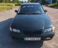 Зеленый Мазда 626, объемом двигателя 2 л и пробегом 417 тыс. км за 2100 $, фото 1 на Automoto.ua