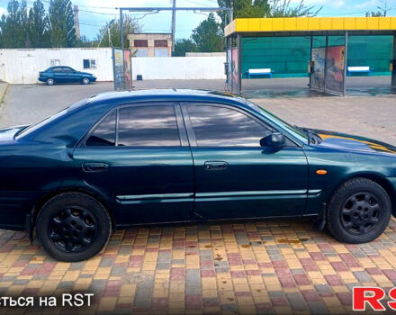 Зелений Мазда 626, об'ємом двигуна 2 л та пробігом 350 тис. км за 2750 $, фото 3 на Automoto.ua