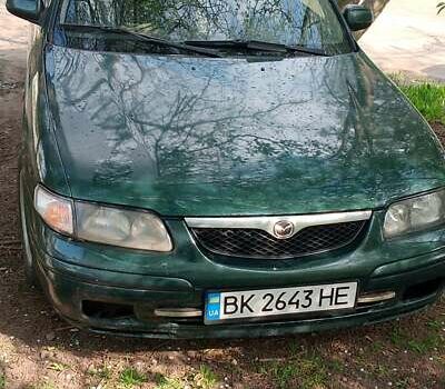 Зелений Мазда 626, об'ємом двигуна 2 л та пробігом 300 тис. км за 1500 $, фото 1 на Automoto.ua