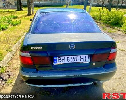 Зелений Мазда 626, об'ємом двигуна 1.8 л та пробігом 390 тис. км за 2000 $, фото 2 на Automoto.ua
