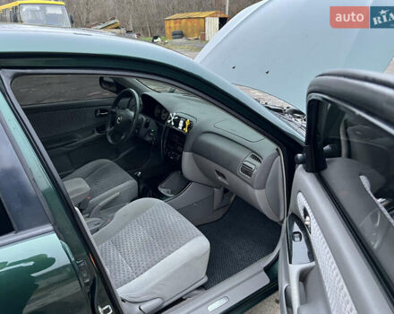 Зеленый Мазда 626, объемом двигателя 2 л и пробегом 286 тыс. км за 3500 $, фото 15 на Automoto.ua