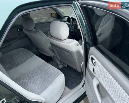 Зеленый Мазда 626, объемом двигателя 2 л и пробегом 286 тыс. км за 3500 $, фото 16 на Automoto.ua