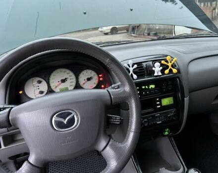 Зеленый Мазда 626, объемом двигателя 2 л и пробегом 286 тыс. км за 3500 $, фото 10 на Automoto.ua