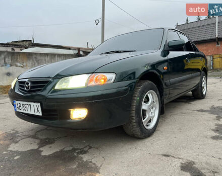 Зеленый Мазда 626, объемом двигателя 2 л и пробегом 286 тыс. км за 3500 $, фото 1 на Automoto.ua