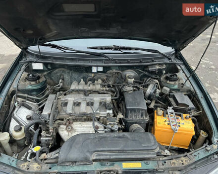 Зеленый Мазда 626, объемом двигателя 2 л и пробегом 286 тыс. км за 3500 $, фото 4 на Automoto.ua