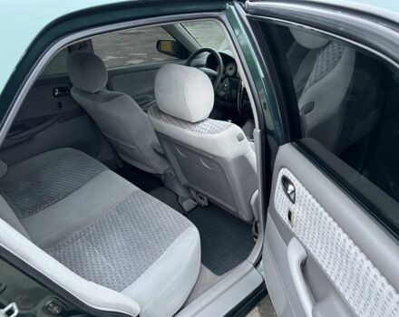 Зеленый Мазда 626, объемом двигателя 2 л и пробегом 286 тыс. км за 3500 $, фото 16 на Automoto.ua