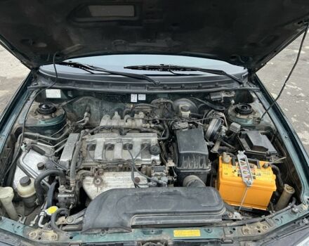 Зеленый Мазда 626, объемом двигателя 2 л и пробегом 286 тыс. км за 3500 $, фото 4 на Automoto.ua