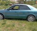 Зеленый Мазда 626, объемом двигателя 1.8 л и пробегом 230 тыс. км за 2999 $, фото 1 на Automoto.ua