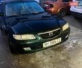 Зеленый Мазда 626, объемом двигателя 2 л и пробегом 245 тыс. км за 2300 $, фото 1 на Automoto.ua