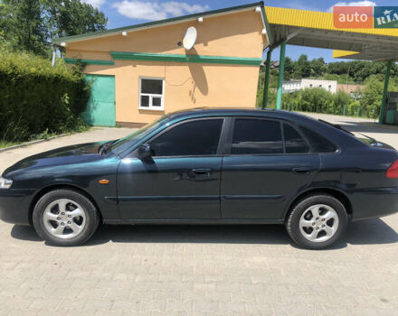 Зеленый Мазда 626, объемом двигателя 2 л и пробегом 304 тыс. км за 2900 $, фото 7 на Automoto.ua