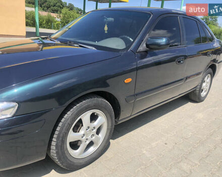 Зеленый Мазда 626, объемом двигателя 2 л и пробегом 304 тыс. км за 2900 $, фото 6 на Automoto.ua