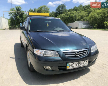 Зеленый Мазда 626, объемом двигателя 2 л и пробегом 304 тыс. км за 2900 $, фото 1 на Automoto.ua
