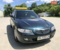 Зеленый Мазда 626, объемом двигателя 2 л и пробегом 304 тыс. км за 2900 $, фото 1 на Automoto.ua