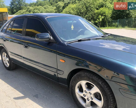 Зеленый Мазда 626, объемом двигателя 2 л и пробегом 304 тыс. км за 2900 $, фото 20 на Automoto.ua