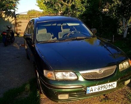 Зеленый Мазда 626, объемом двигателя 2 л и пробегом 315 тыс. км за 1800 $, фото 4 на Automoto.ua