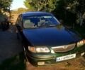 Зеленый Мазда 626, объемом двигателя 2 л и пробегом 315 тыс. км за 1800 $, фото 4 на Automoto.ua