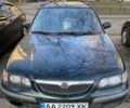 Зеленый Мазда 626, объемом двигателя 2 л и пробегом 380 тыс. км за 1750 $, фото 1 на Automoto.ua
