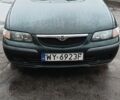 Зеленый Мазда 626, объемом двигателя 2 л и пробегом 320 тыс. км за 1499 $, фото 1 на Automoto.ua