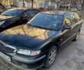 Зеленый Мазда 626, объемом двигателя 2 л и пробегом 380 тыс. км за 1750 $, фото 4 на Automoto.ua