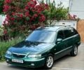 Зеленый Мазда 626, объемом двигателя 2 л и пробегом 200 тыс. км за 3699 $, фото 1 на Automoto.ua