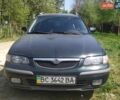 Зеленый Мазда 626, объемом двигателя 2 л и пробегом 327 тыс. км за 1470 $, фото 1 на Automoto.ua