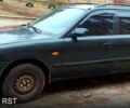 Зеленый Мазда 626, объемом двигателя 2 л и пробегом 400 тыс. км за 3100 $, фото 1 на Automoto.ua