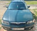 Зеленый Мазда 626, объемом двигателя 2 л и пробегом 400 тыс. км за 2500 $, фото 12 на Automoto.ua