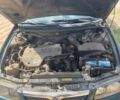 Зеленый Мазда 626, объемом двигателя 2 л и пробегом 400 тыс. км за 2500 $, фото 1 на Automoto.ua