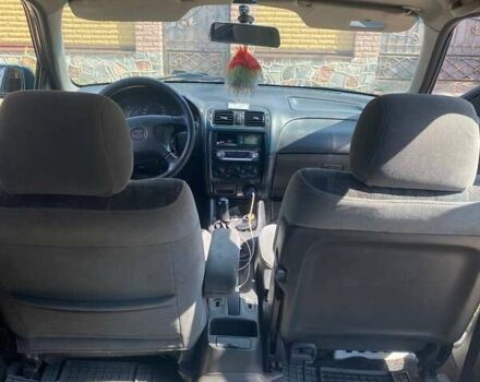 Зеленый Мазда 626, объемом двигателя 2 л и пробегом 400 тыс. км за 2500 $, фото 3 на Automoto.ua