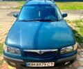 Зеленый Мазда 626, объемом двигателя 2 л и пробегом 400 тыс. км за 2500 $, фото 8 на Automoto.ua